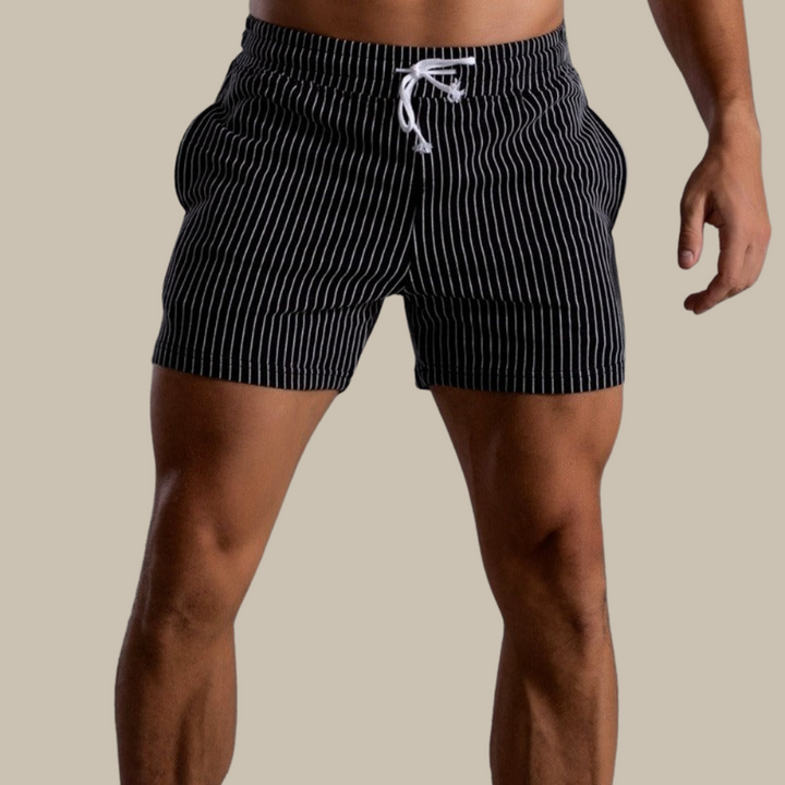 Sporty men's quick-dry athletic swim shorts in durable ripstop polyester for pool & beach.