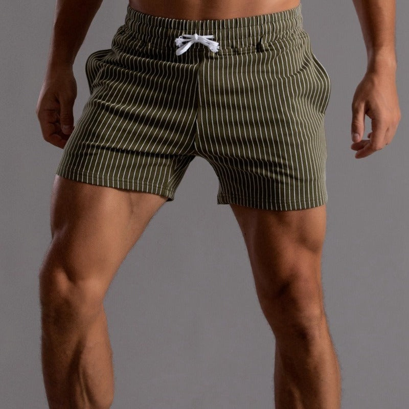 Slim fit men's quick-dry swim trunks. Modern beachwear & pool shorts for summer fashion.