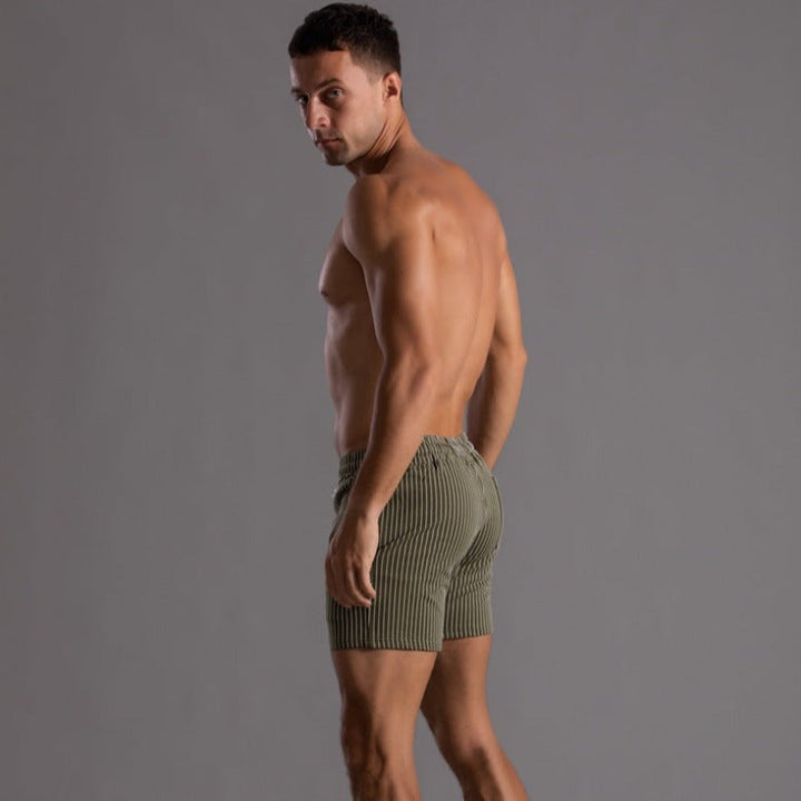 Men's stylish quick-dry swim shorts. Durable ripstop polyester, perfect for beach & pool activities.