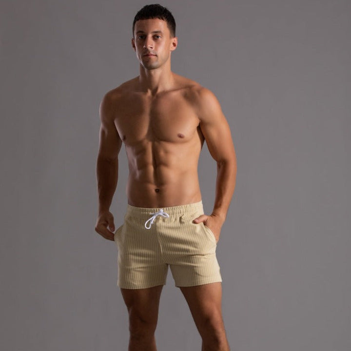 Ripstop men's quick-dry swim trunks. Stylish design, ideal for pool, beach, and active summer.