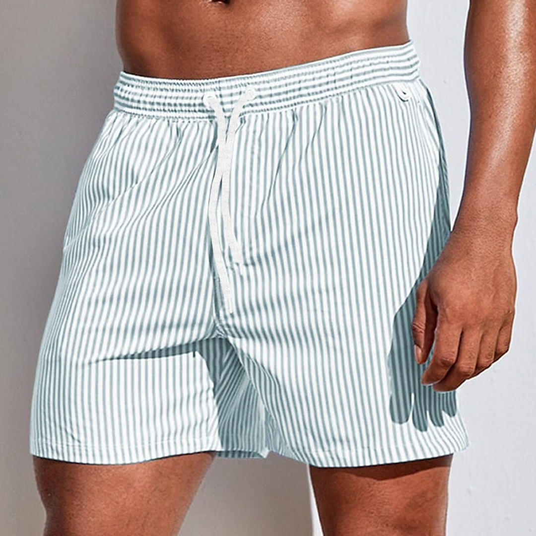 Trendy men's quick-dry striped beach shorts, ideal for swimming, surfing, and comfortable summer fashion.