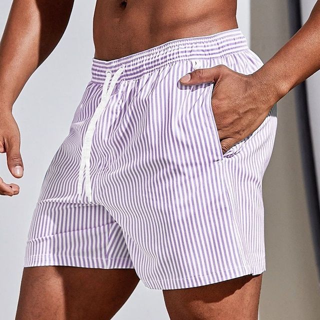 High-performance men's quick dry swim shorts. Durable summer fashion, perfect for beach, pool, or activewear.