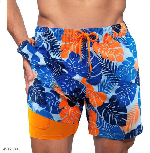 Quick-dry men's swim shorts featuring a comfortable compression liner for active use.