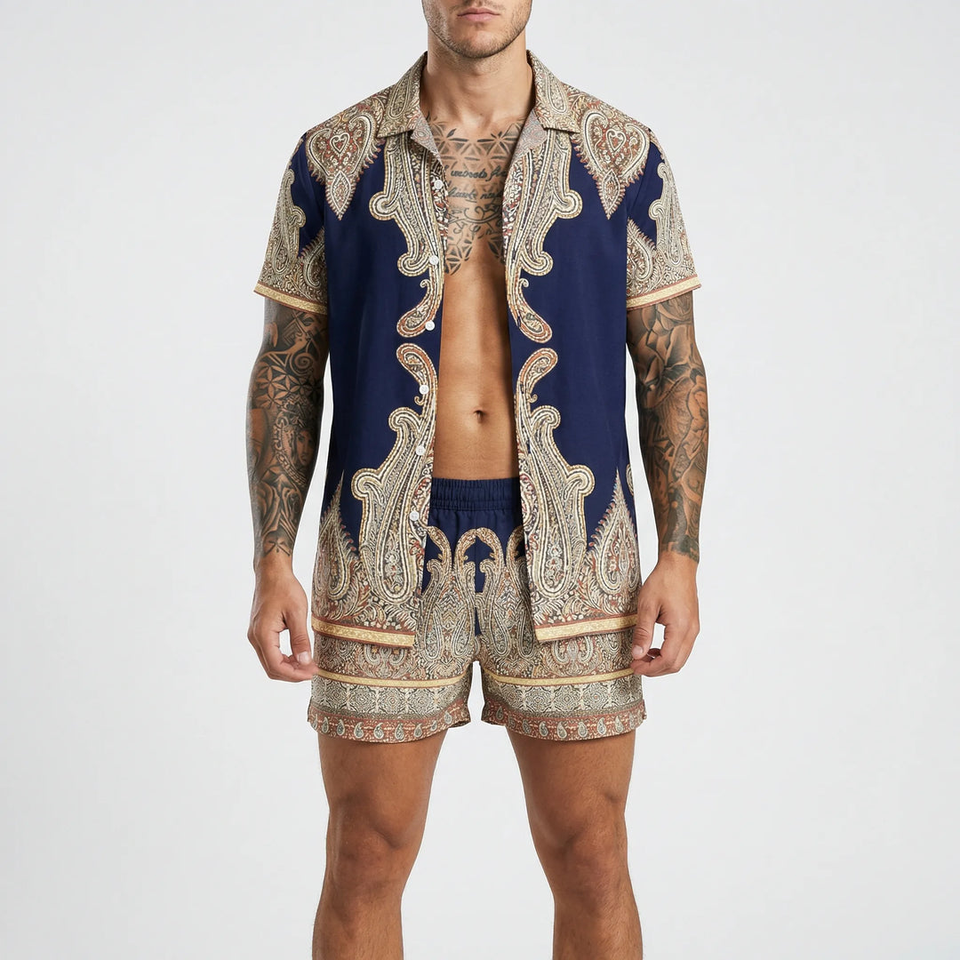 Man walking in a bold print relaxed fit two-piece summer outfit, dynamic casual wear.