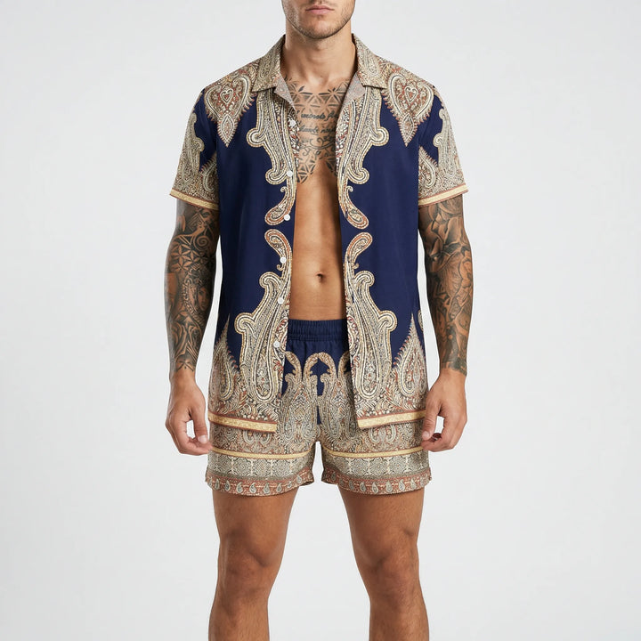 Man walking in a bold print relaxed fit two-piece summer outfit, dynamic casual wear.