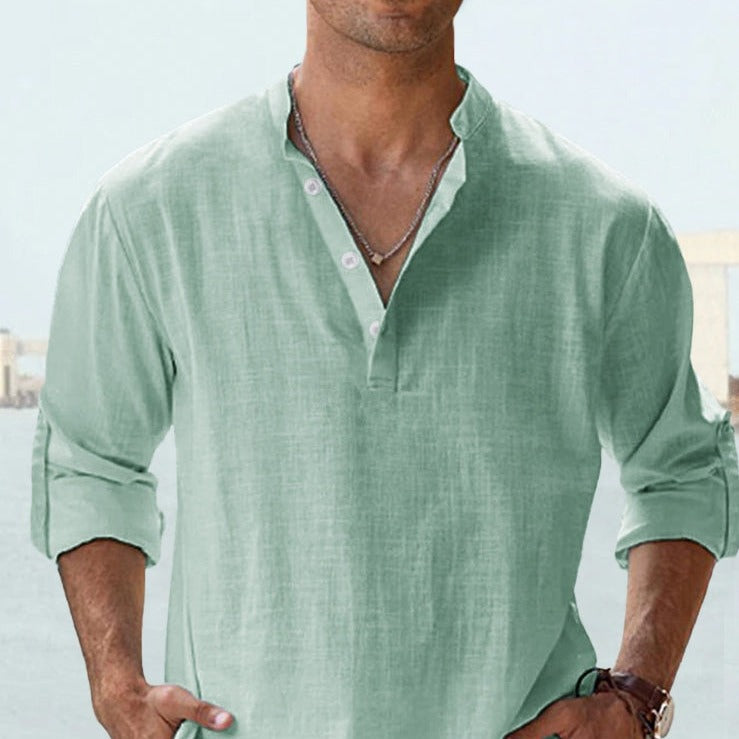 Men's relaxed fit breathable summer shirt on a hanger. Short sleeve casual top for warm weather everyday fashion.