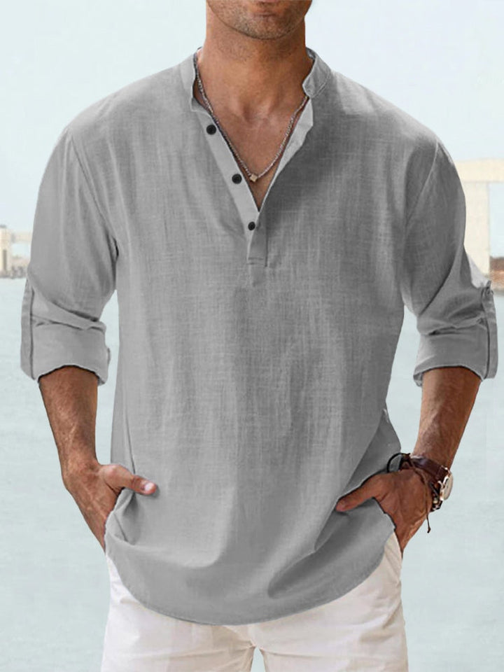 Man wearing a relaxed fit breathable short sleeve summer shirt, perfect for casual warm weather days.