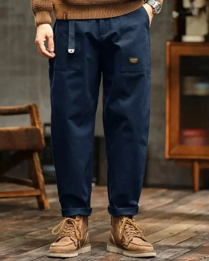 Men's relaxed fit cargo pants with ample pockets, designed for comfort, utility, and everyday wear.