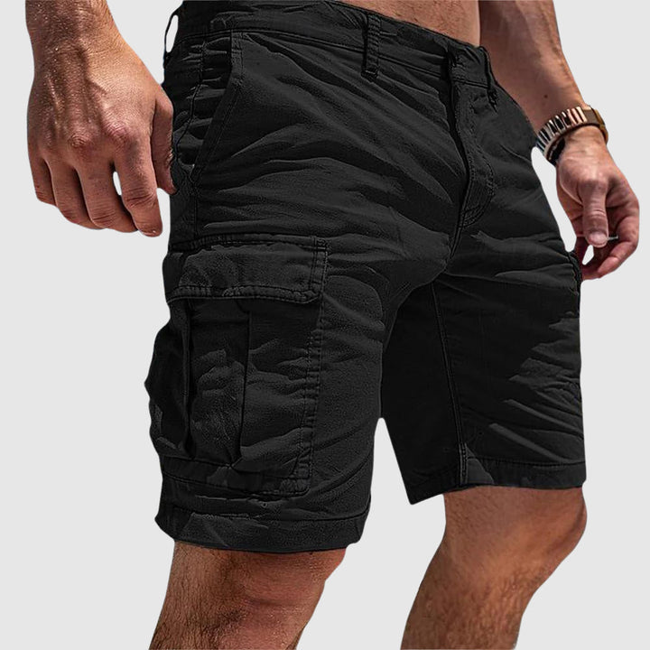 Durable men's cargo shorts with a relaxed fit, perfect for summer adventures, offering ample storage & style.