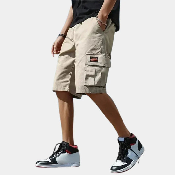 Durable men's cargo shorts with multiple pockets, ideal for outdoor activities, travel, and casual summer wear.