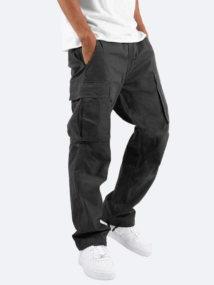 Men's relaxed fit cargo trousers in olive green, perfect for casual everyday wear with practical utility pockets.
