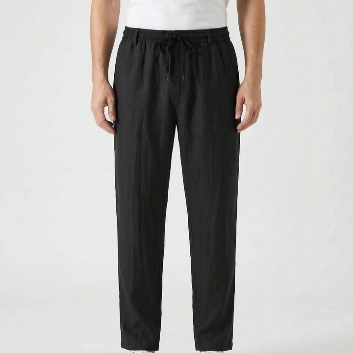 Stylish men's relaxed fit summer trousers, elastic waist, versatile for casual warm weather comfort.