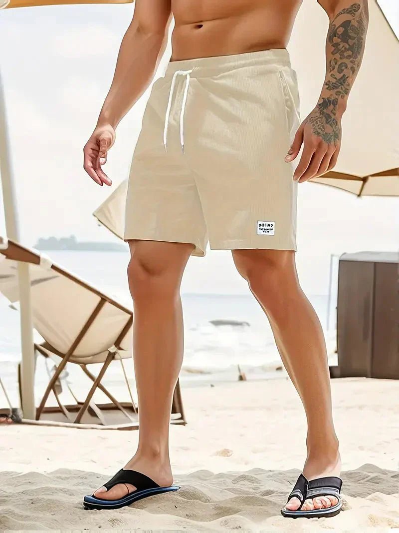 Comfortable men's drawstring shorts, relaxed fit, textured for everyday casual wear.