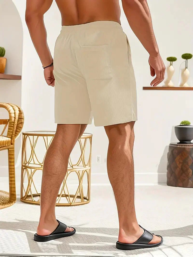 Casual summer men's shorts: relaxed fit, drawstring, and essential side pockets.