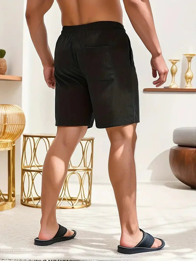 Summer-ready relaxed fit men's drawstring shorts with a comfortable textured feel.