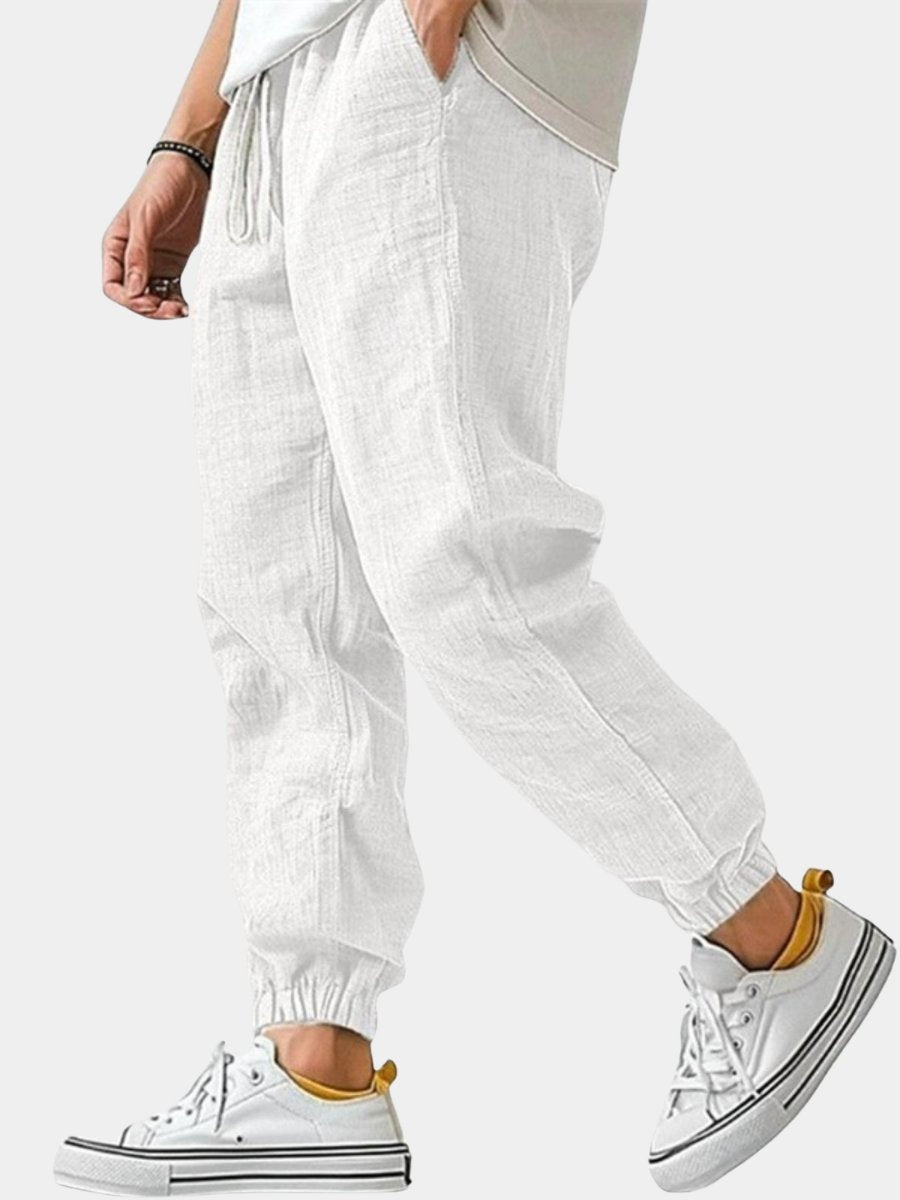 Men's relaxed fit cuffed jogger pants in gray, perfect for casual wear, travel, and everyday comfort.