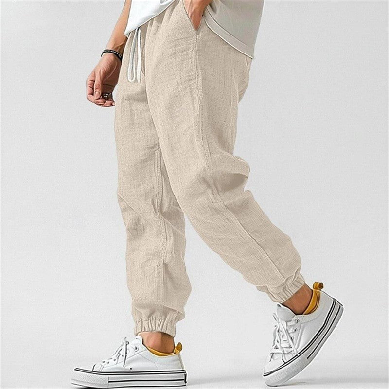 Classic men's track pants, cuffed for a modern look. Relaxed fit offers all-day comfort for any activity.