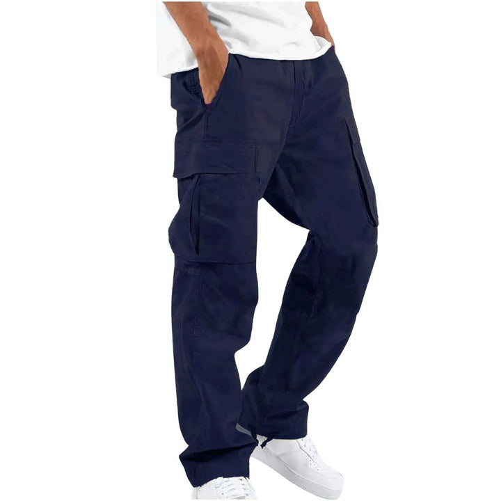 Man wearing stylish men's drawstring cargo pants, perfect for casual comfort, utility, and outdoor fashion.