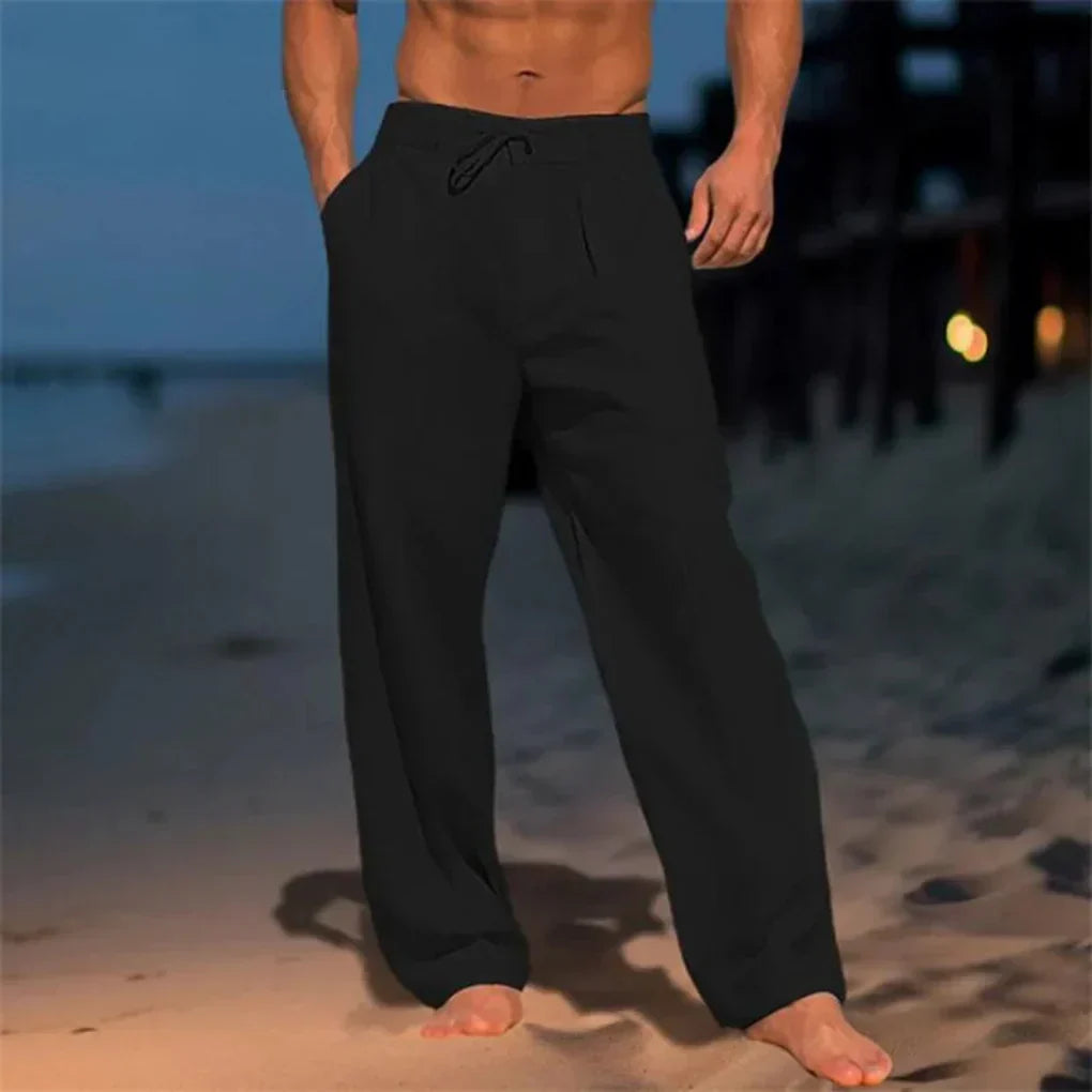Close-up of men's relaxed fit dress pants, showcasing the comfortable fabric & practical drawstring waist.
