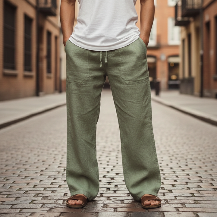 Stylish men's relaxed fit linen trousers with drawstring, great for summer fashion & casual events.