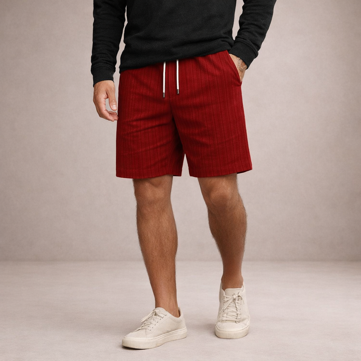 Drawstring men's shorts, relaxed fit, perfect beachwear for summer vacation.