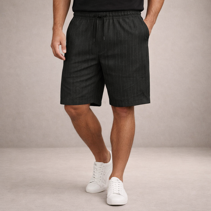 Comfortable men's drawstring shorts, knee-length for warm weather & casual wear.