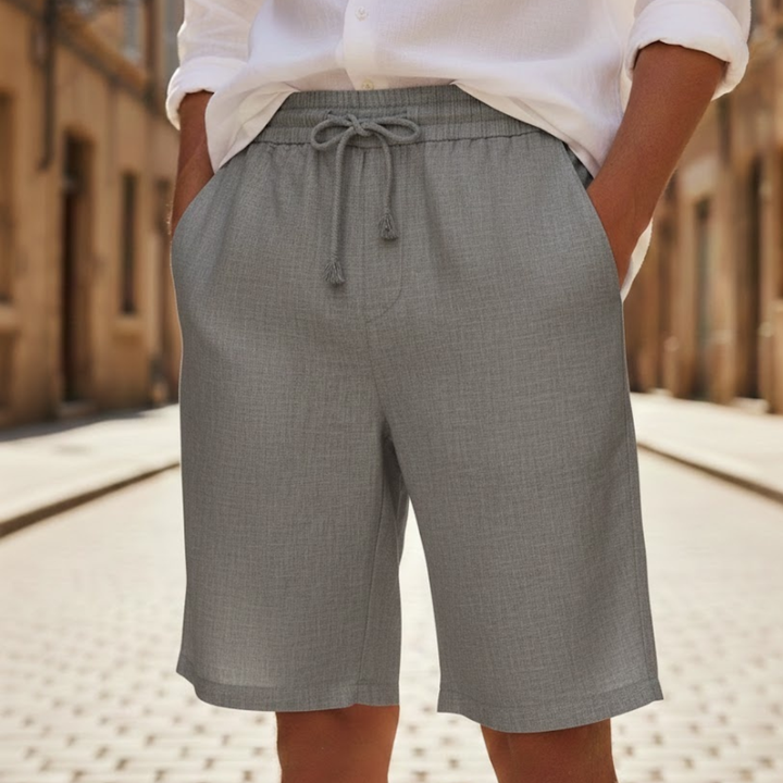 Men's relaxed fit drawstring shorts in blue, perfect for summer comfort & casual everyday wear.