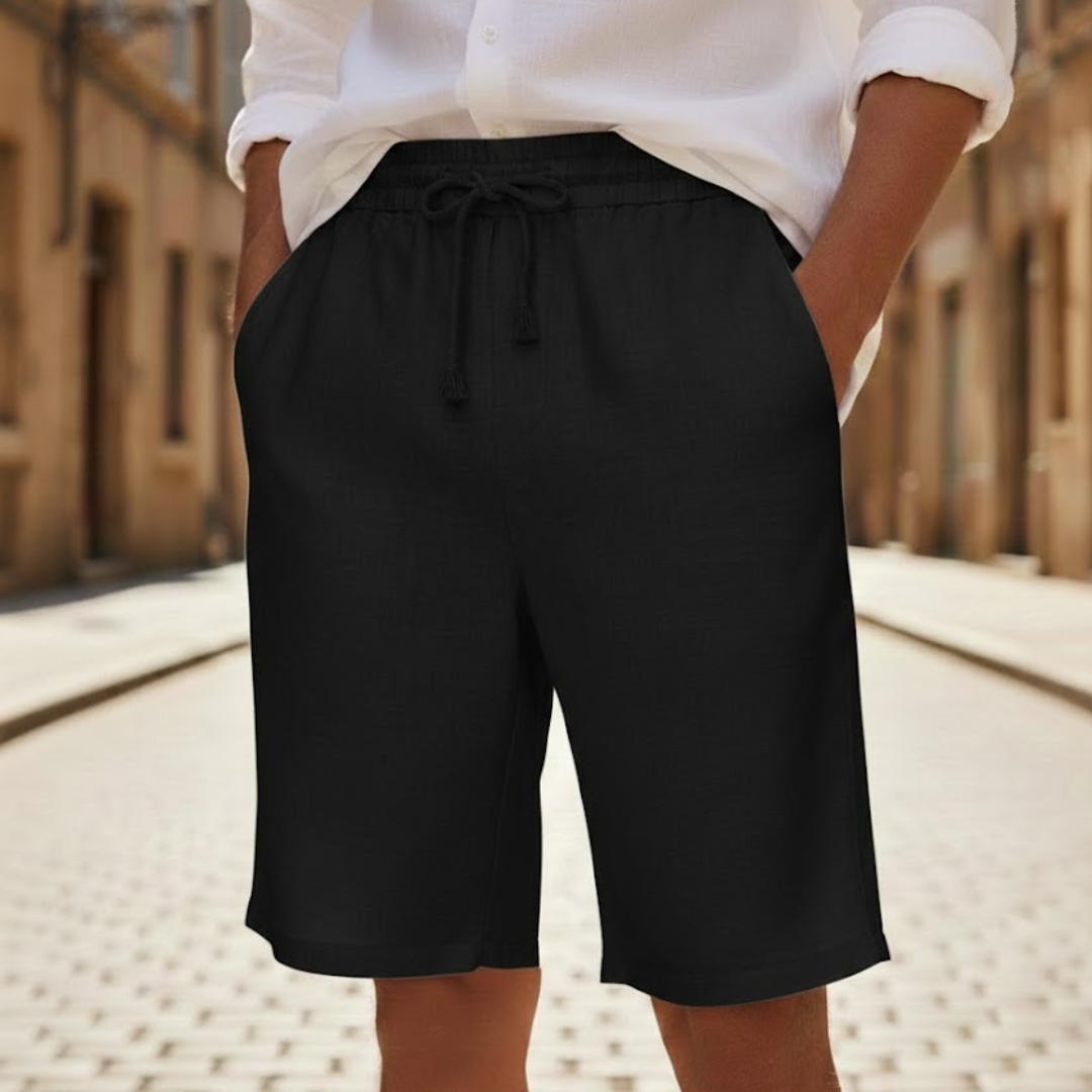 Model wearing men's relaxed fit shorts, demonstrating the loose, comfortable style for summer fashion.