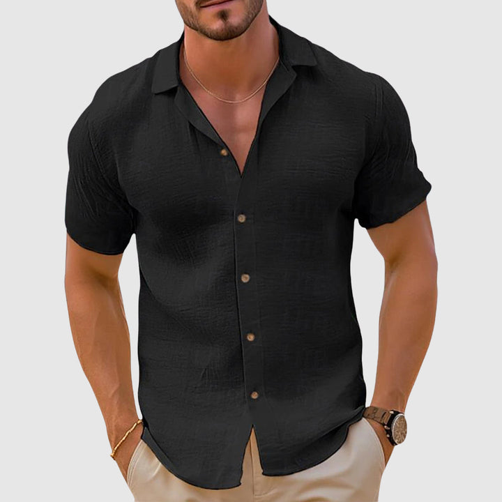 Versatile men's linen button-down shirt. Breathable, comfortable long-sleeve top for casual everyday wear.