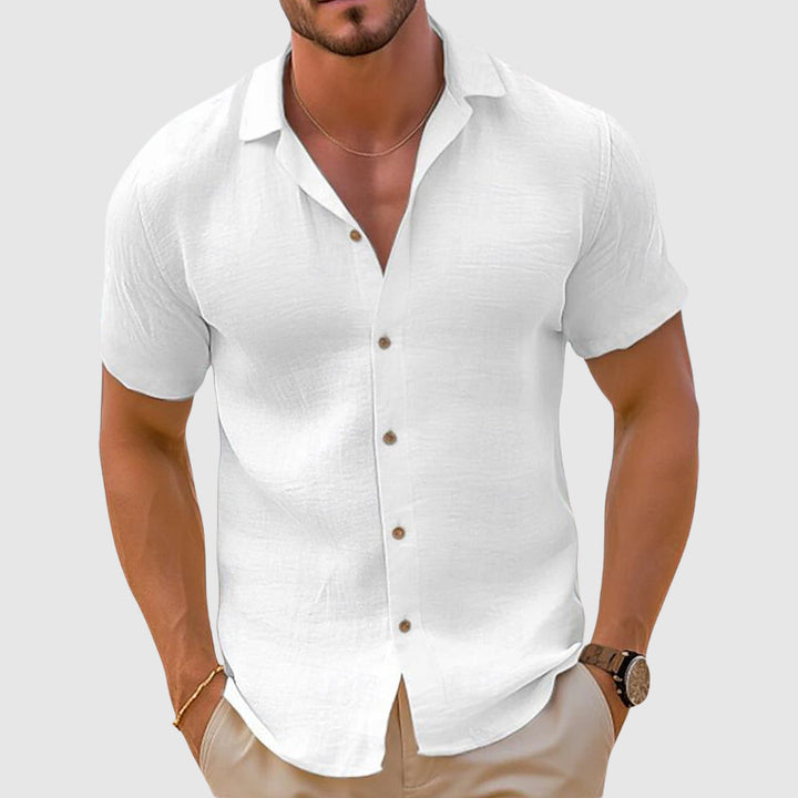 Casual men's long-sleeve linen shirt with a relaxed fit. Effortless button-down style, breathable for summer.