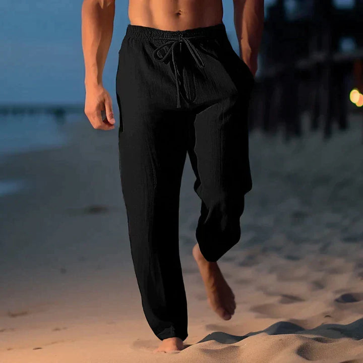 Breathable men's linen drawstring pants in a relaxed fit, ideal for warm weather casual fashion.