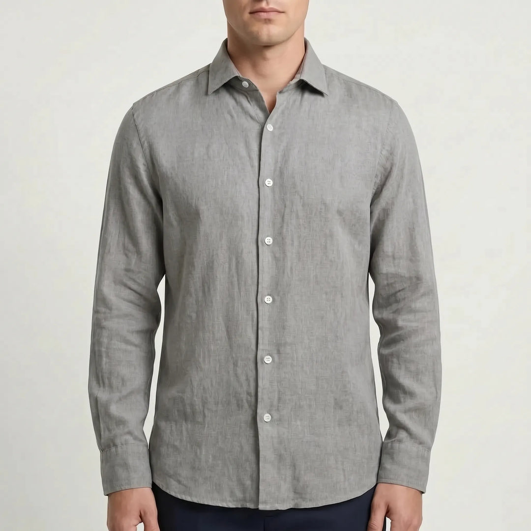 Back view of a men's relaxed long-sleeve button-up shirt, showcasing its comfortable drape and fit.