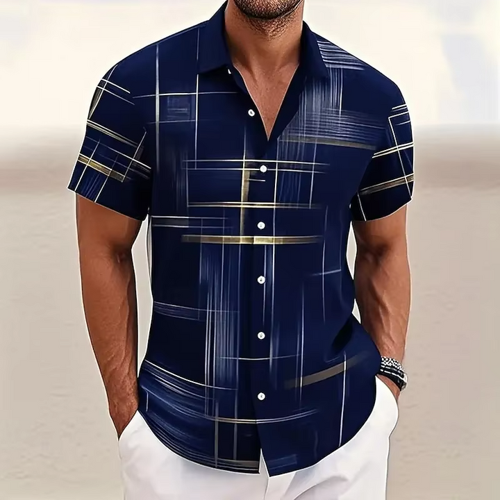 Men's relaxed fit polo shirt with a modern geometric print. Short sleeve, perfect for casual summer style.