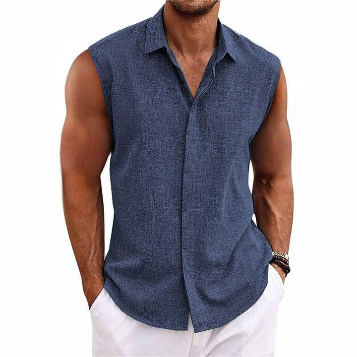 Man wearing a relaxed fit sleeveless button-down shirt, great for summer parties, beach, or casual outings.