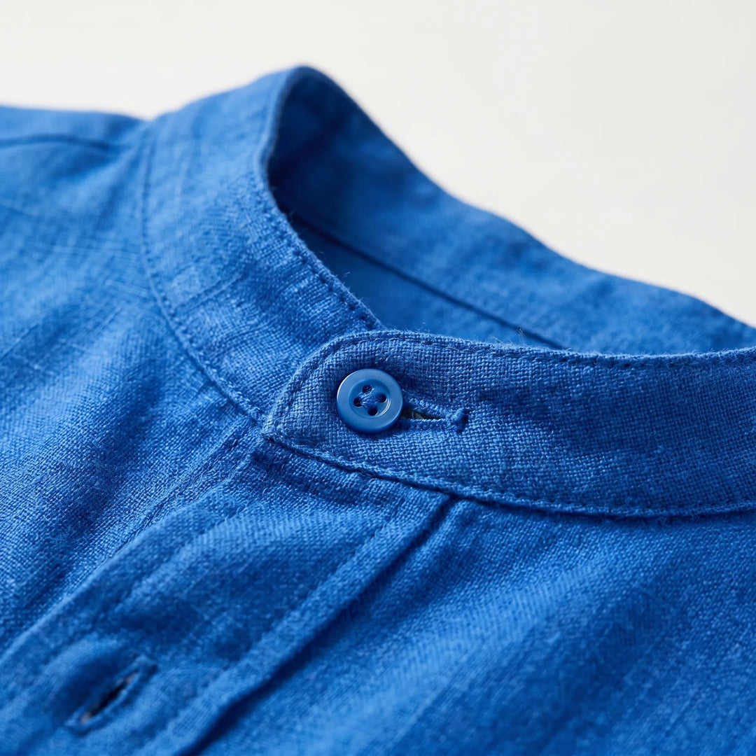 Versatile men's solid color stand collar long sleeve shirt, great for casual and everyday wear.
