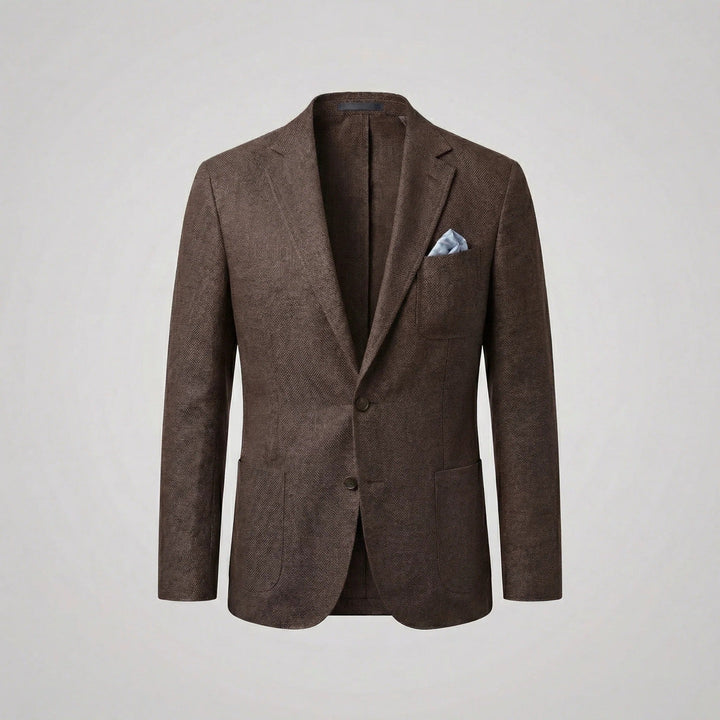 Man's relaxed fit blazer styled with accessories, demonstrating smart-casual summer jacket menswear.