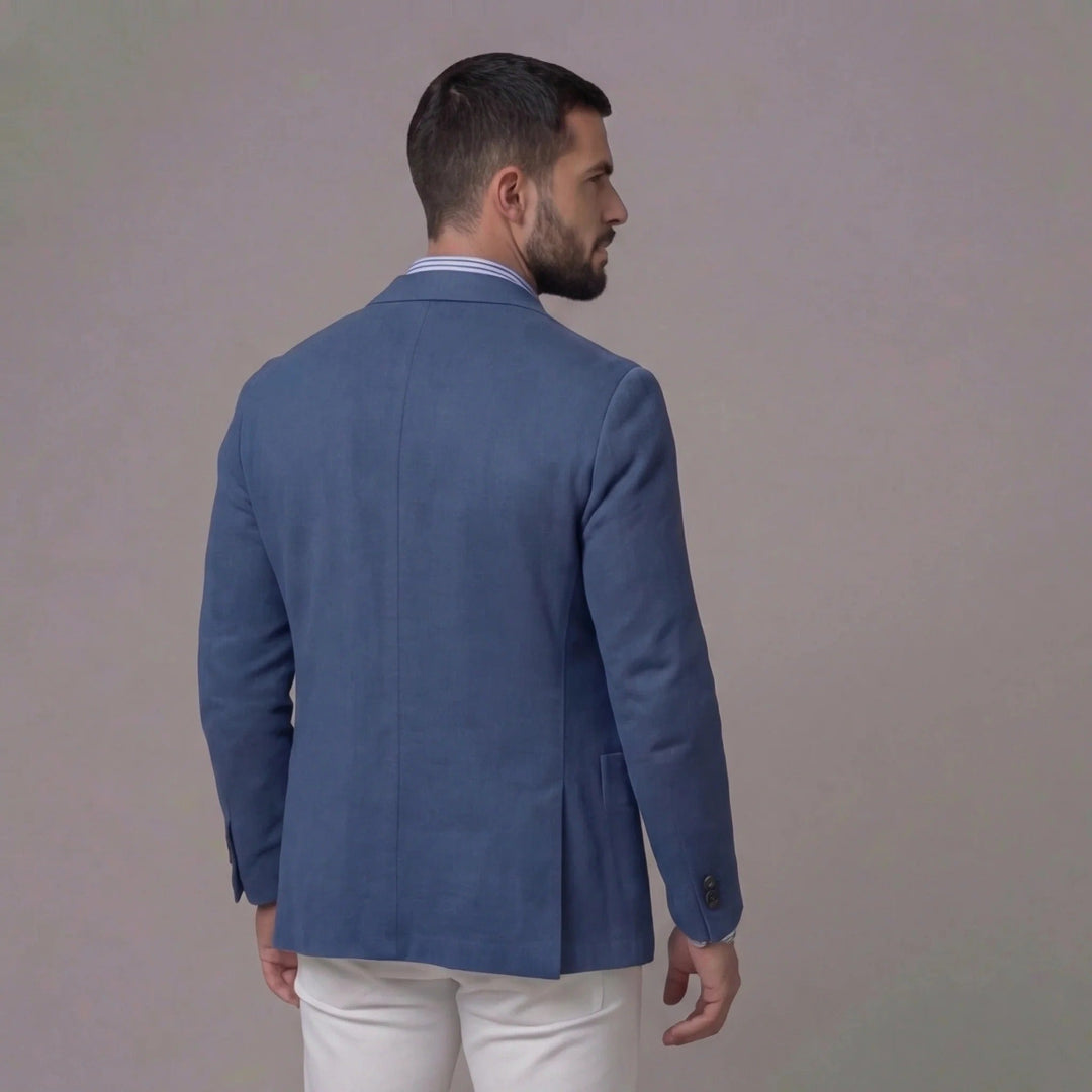 Stylish man in smart-casual outfit featuring a lightweight men's summer blazer jacket.