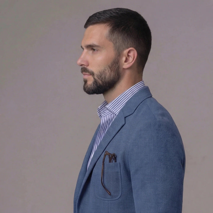 Back view: Men's relaxed fit summer blazer, showcasing its modern, comfortable jacket silhouette.
