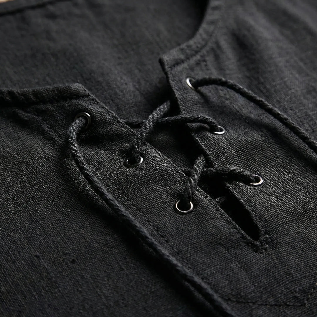 Stylish men's half-sleeve v-neck top with lace-up detail, great for relaxed summer outfits.