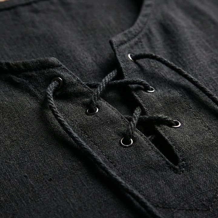 Stylish men's half-sleeve v-neck top with lace-up detail, great for relaxed summer outfits.