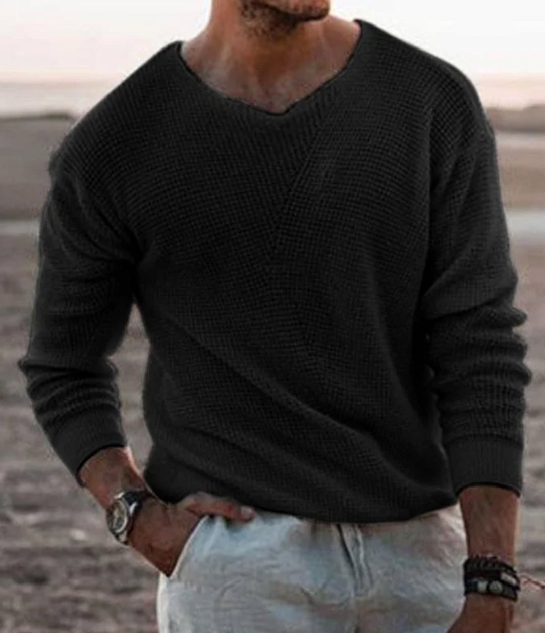 Comfortable men's long-sleeve waffle-knit jumper with a relaxed fit, ideal for autumn wear.