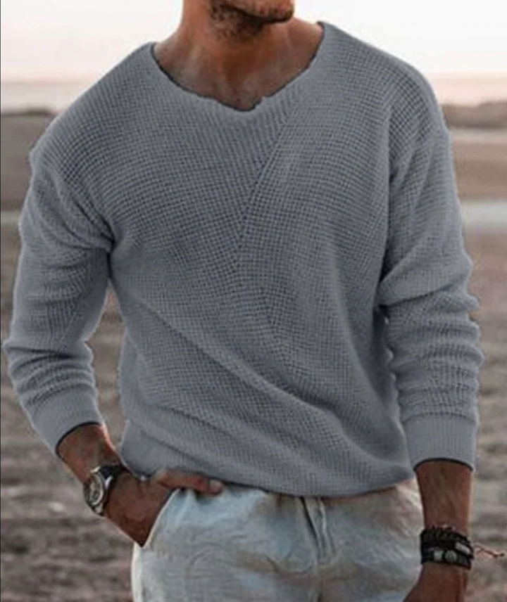 Relaxed fit men's waffle-knit sweater, a cozy long-sleeve piece for versatile casual fashion.