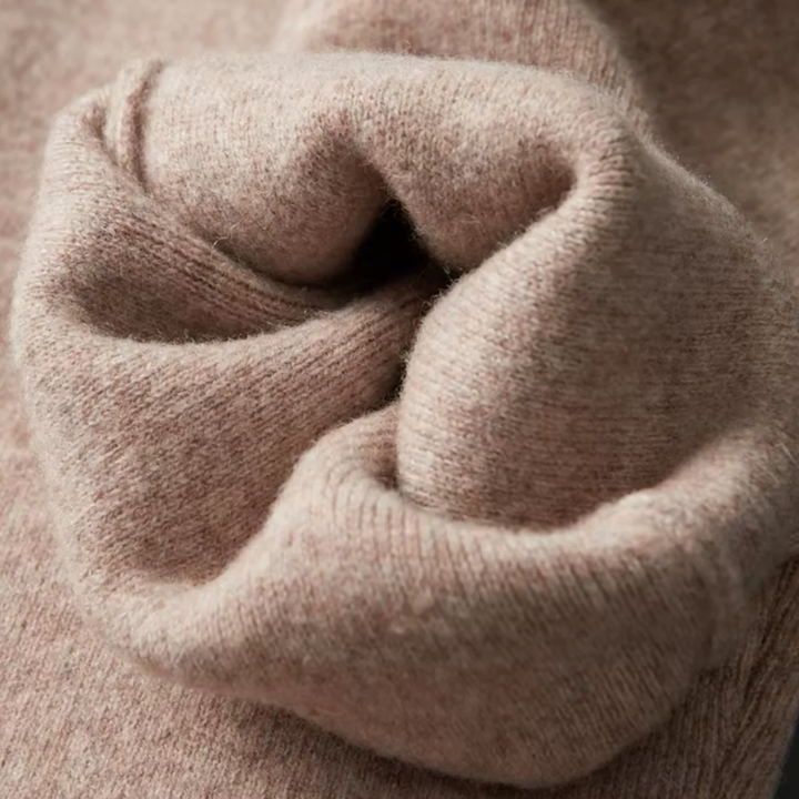 Close-up of men's relaxed fit zip-up sweater, part of a comfortable two-piece lounge set with drawstring pants.