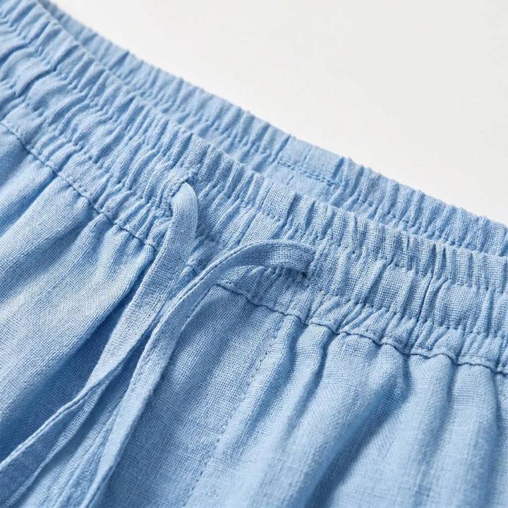 Effortless comfort in men's relaxed fit straight leg pants. Soft fabric pull-on joggers with elastic waist.