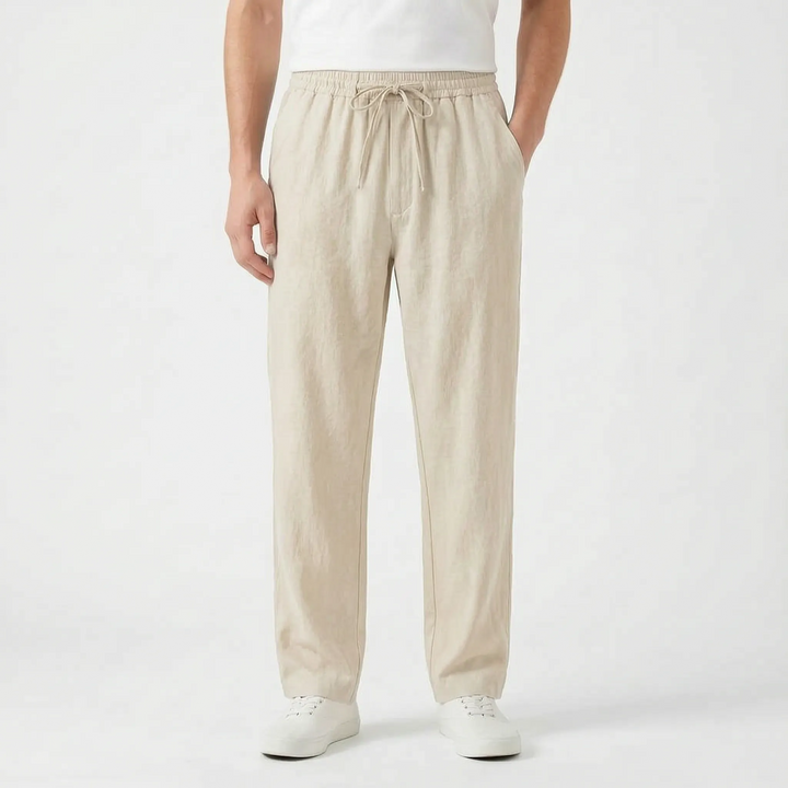 Pull-on men's straight leg pants featuring a relaxed fit & elastic waist. Comfortable joggers for travel & leisure.