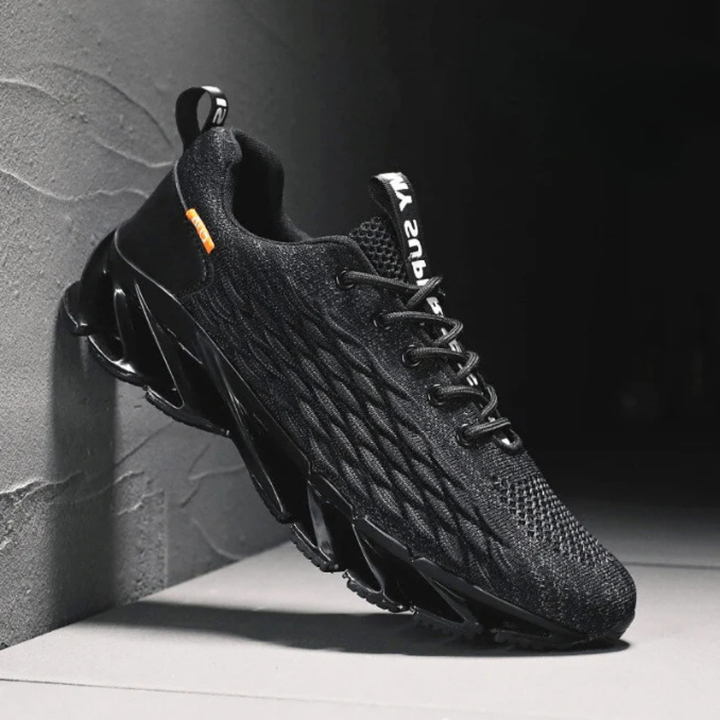 Dynamic men's responsive athletic sneakers with mesh upper, designed for running, training, and everyday comfort.