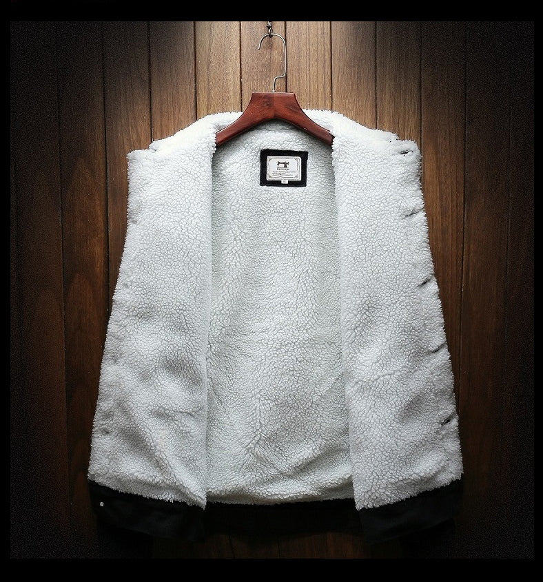 Fleece-lined men's denim jacket in retro style. Durable button-up outerwear for fall & winter warmth.