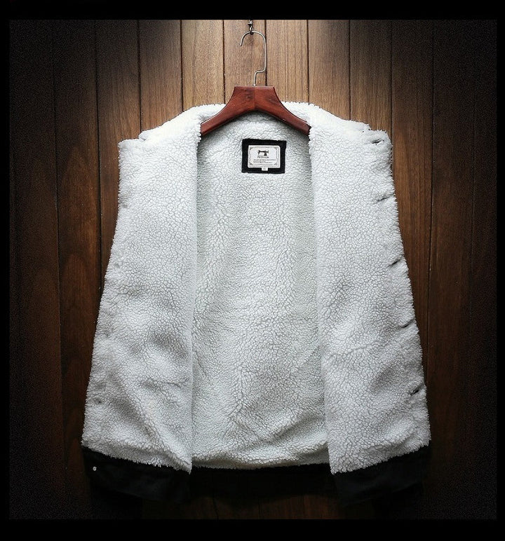Fleece-lined men's denim jacket in retro style. Durable button-up outerwear for fall & winter warmth.