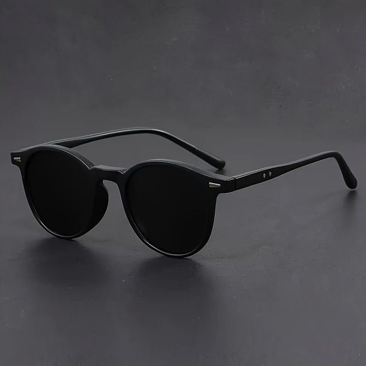 Stylish men's retro round tortoiseshell shades, comfortable and lightweight for all-day wear.