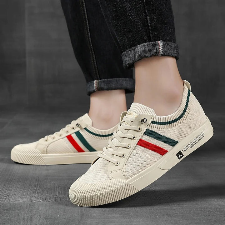 Fashionable men's trainers featuring a retro stripe design, ideal for spring and summer casual wear.